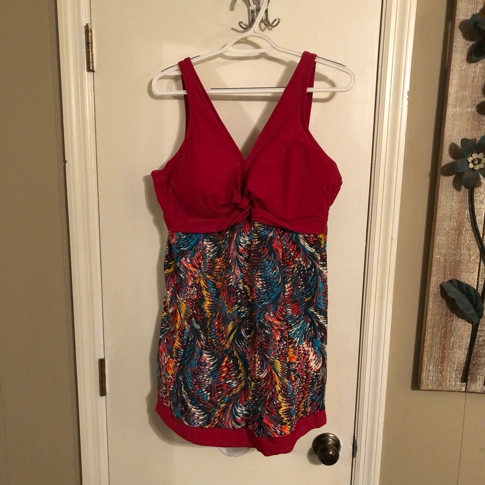 Full swimsuit with hidden boy short bottoms.